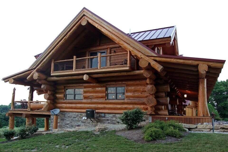 Строительство дома из бревен кедра